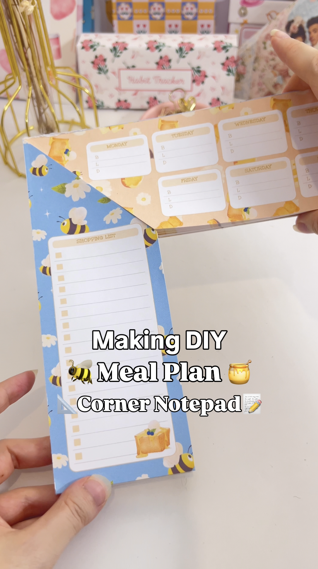 Finished DIY meal plan corner notepad standing on a folded chipboard base
