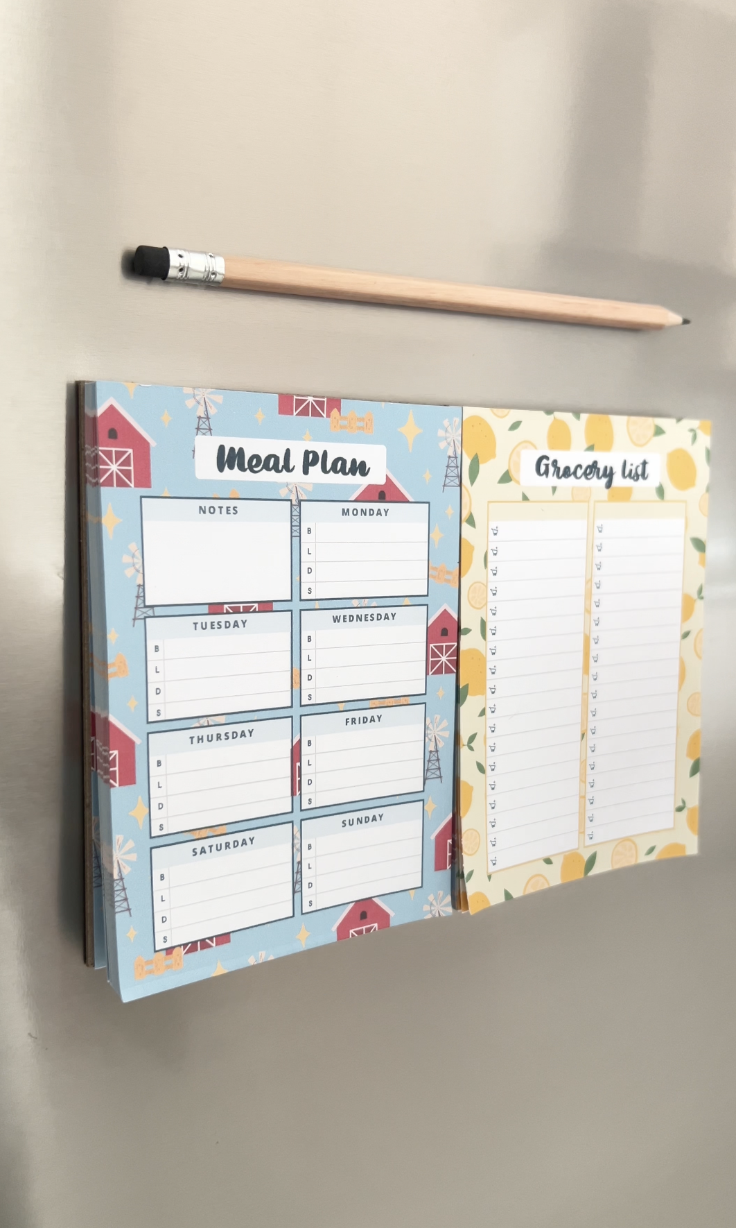 Finished DIY magnetic fridge notepad with meal planner and grocery list stuck to a fridge door