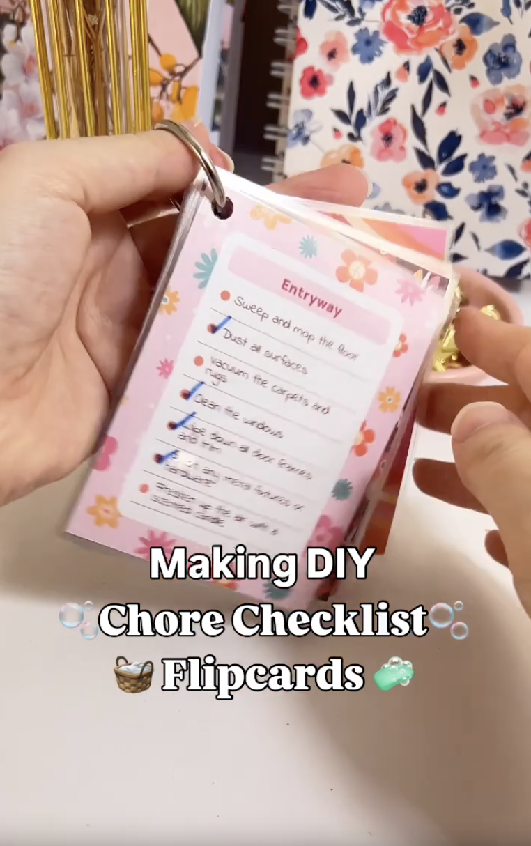 Finished set of laminated DIY chore checklist flipcards held on a card ring