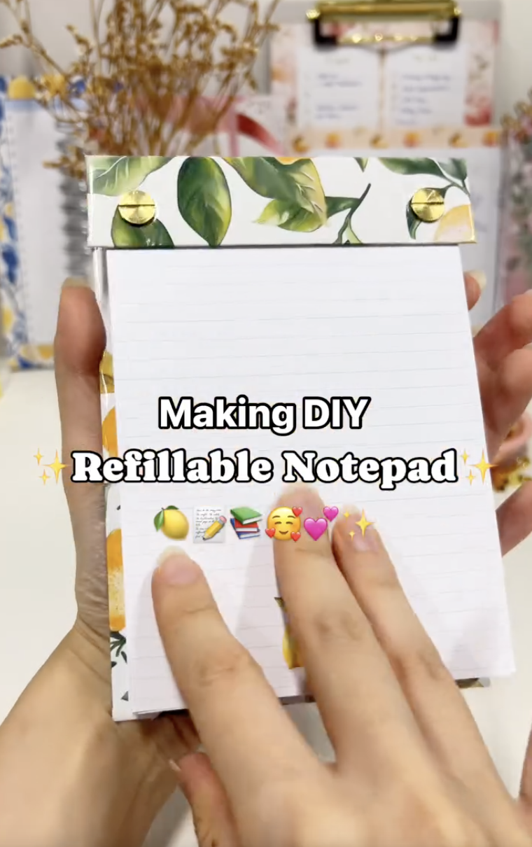 Finished lemon-themed DIY refillable notepad bound with Chicago screws