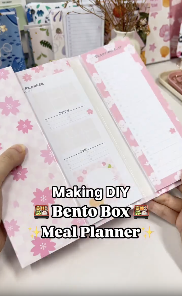 Finished DIY bentobox notepad meal planner open with several notepad compartments