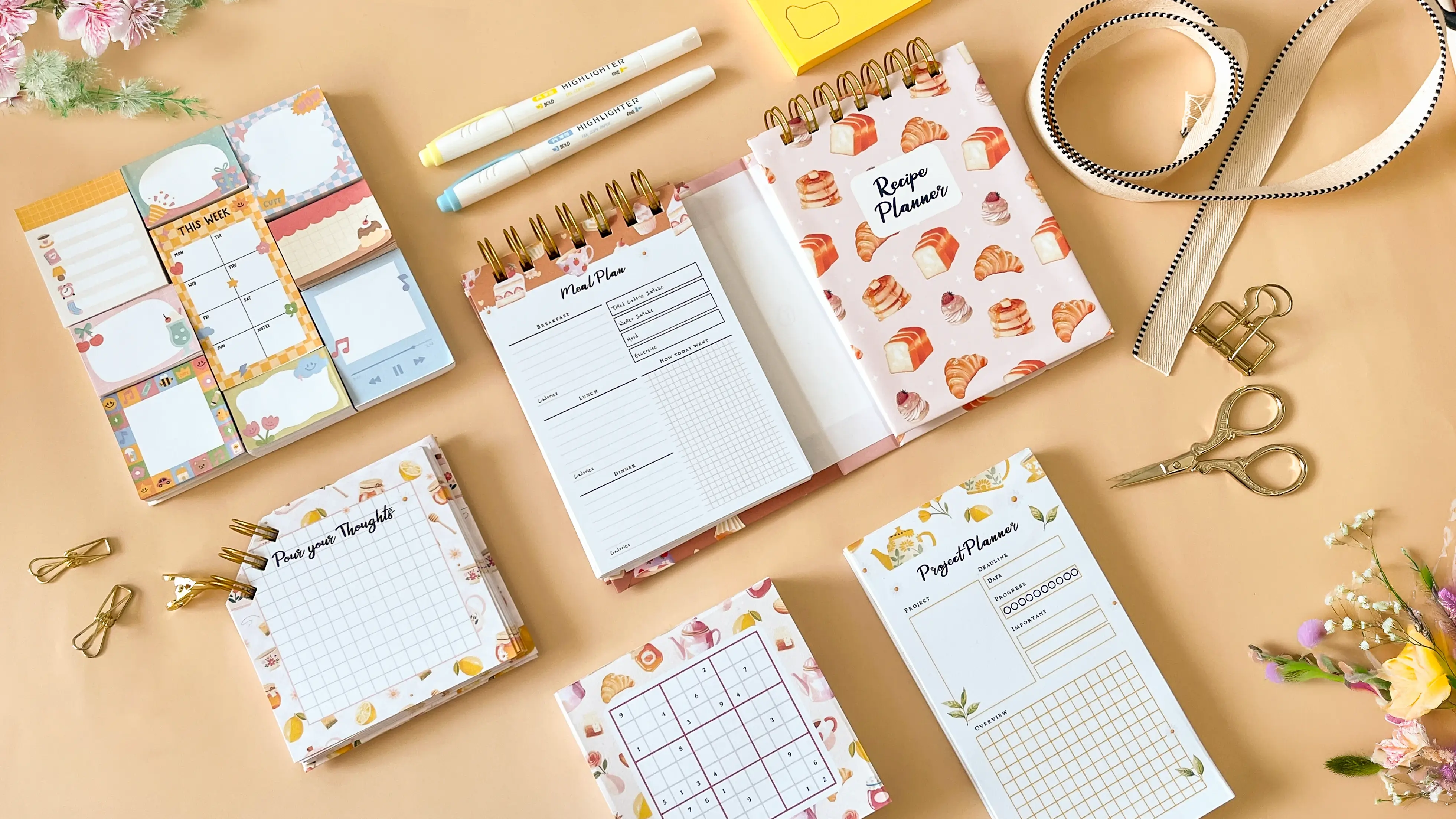 Custom planners and notepads designed and made with Planify Pro