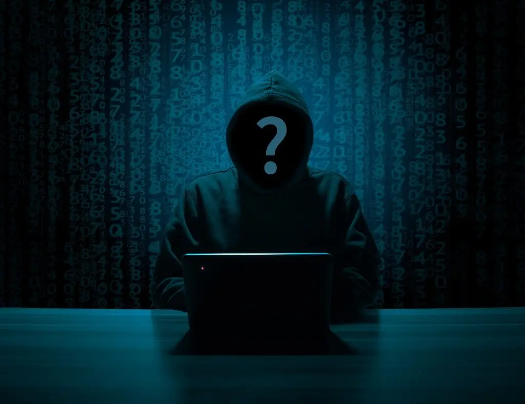 A hacker silhouette, standing in for the Etsy shop account takeover described here
