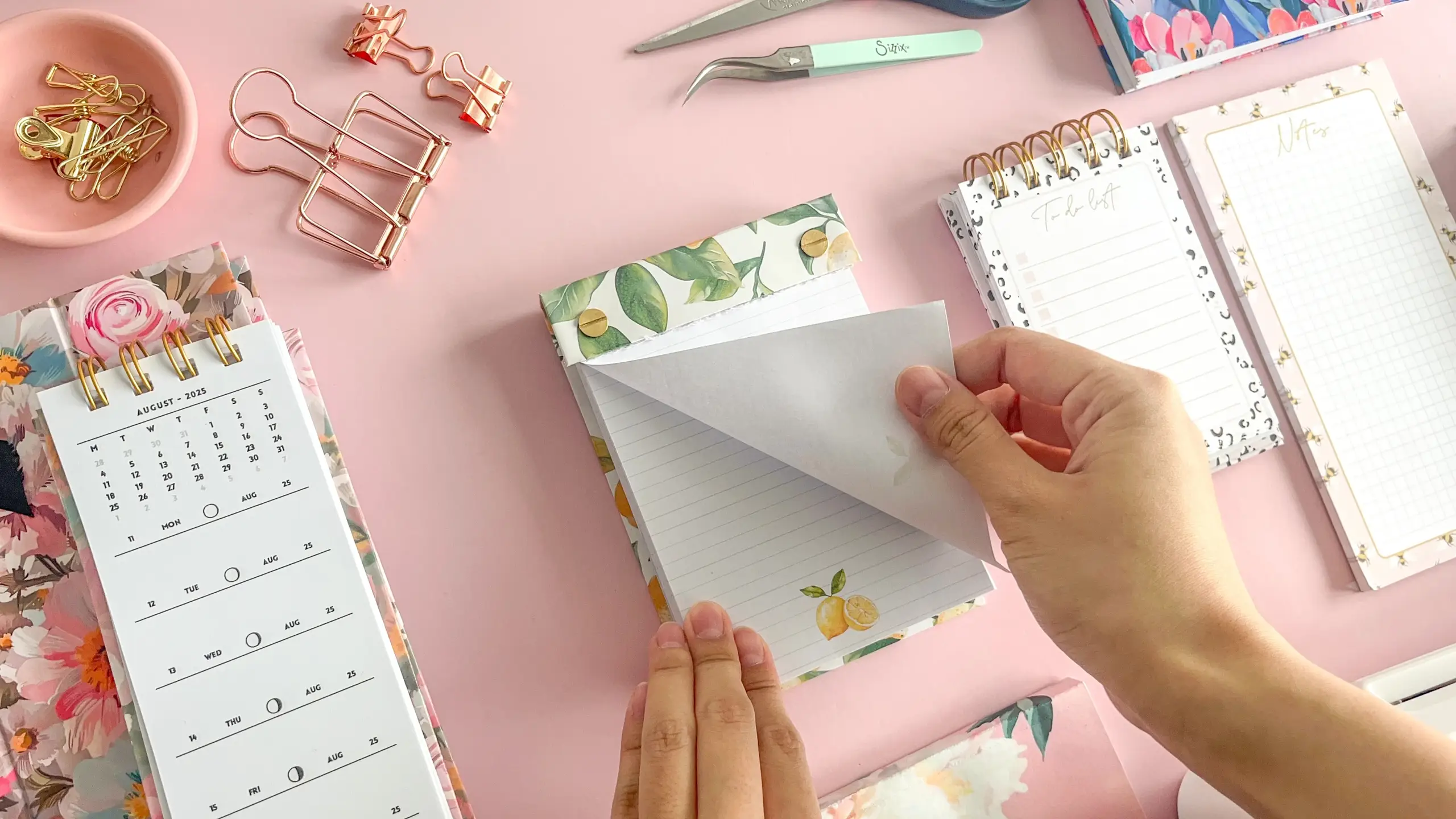 A handmade refillable notepad with tear-off pages, the finished result of this DIY build