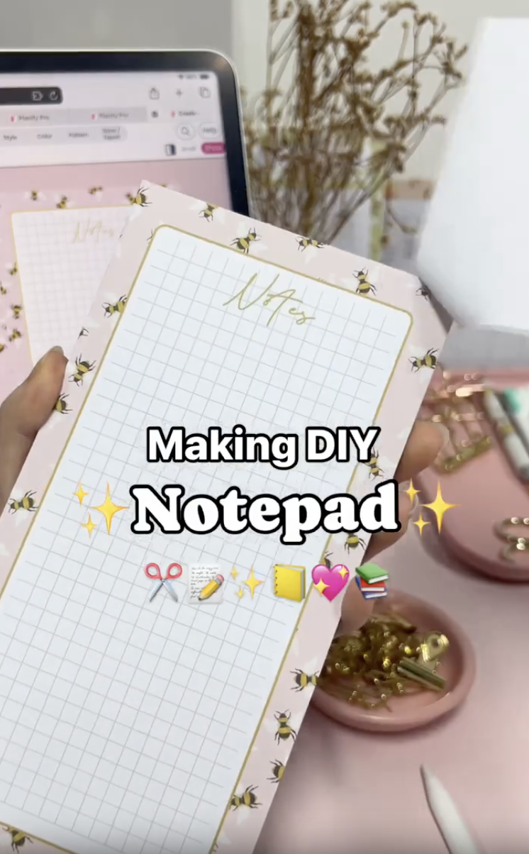 Finished DIY custom notepad with a pink bee design and chipboard backing