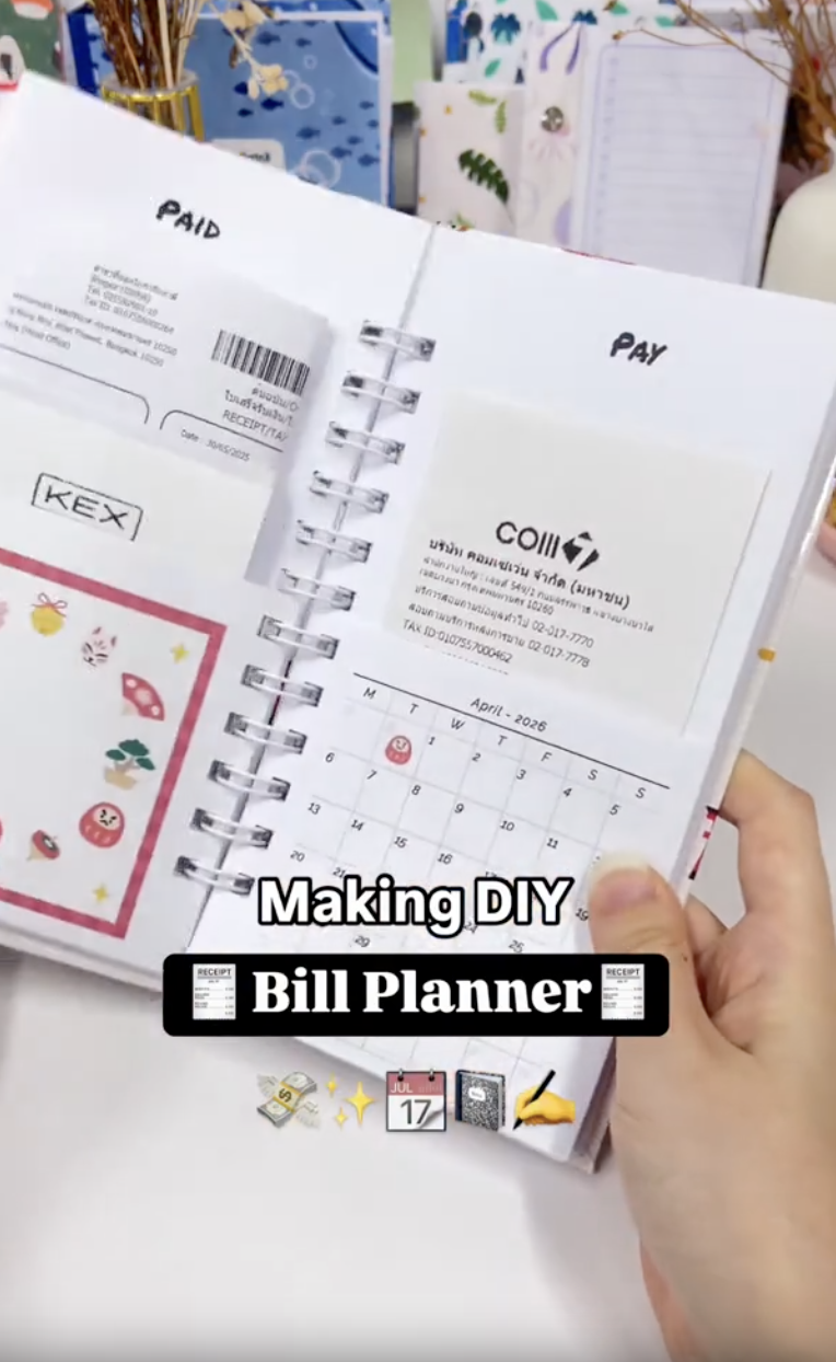 Finished DIY bill planner with wire binding and folded monthly pocket pages